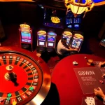 Excited players winning at the casino table branded 58WIN, amidst colorful chips and a spinning roulette.